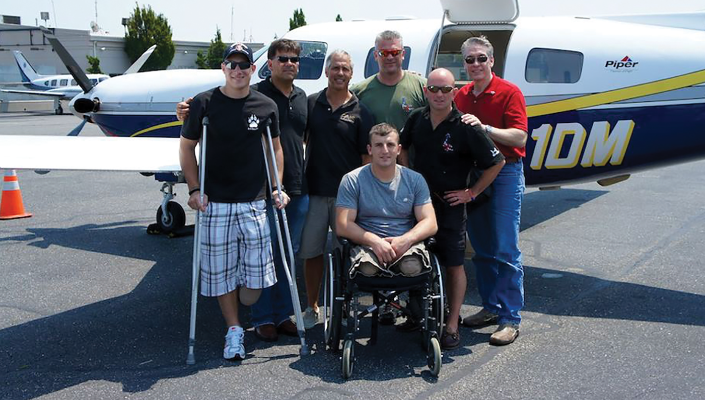 pals-group-in-front-of-plane