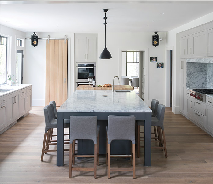 Light and medium grays combine in this modern kitchen for a pleasing contrast.