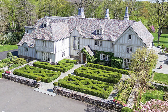 This home has been renovated to offer four levels of stylish and sun-filled living space.