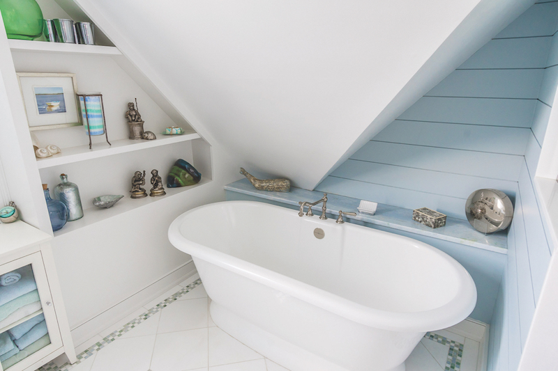 Standing bathtub with blue walls