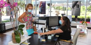 Ali Diaz with a customer
